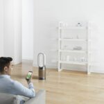 HP09_WHSGLD_063-RGB-SCO-APP-LivingArea-Man-Sofa-PhoneWhite-InHand-CEL-A4_MIX.psd_preview